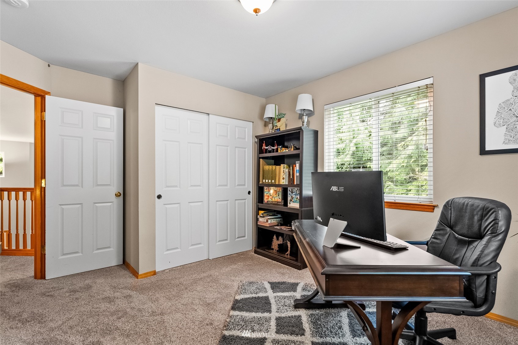 6741 Northwest Ranger Way Silverdale, WA 98383 - Photo 26 of 38 a view of a workspace with furniture and a window