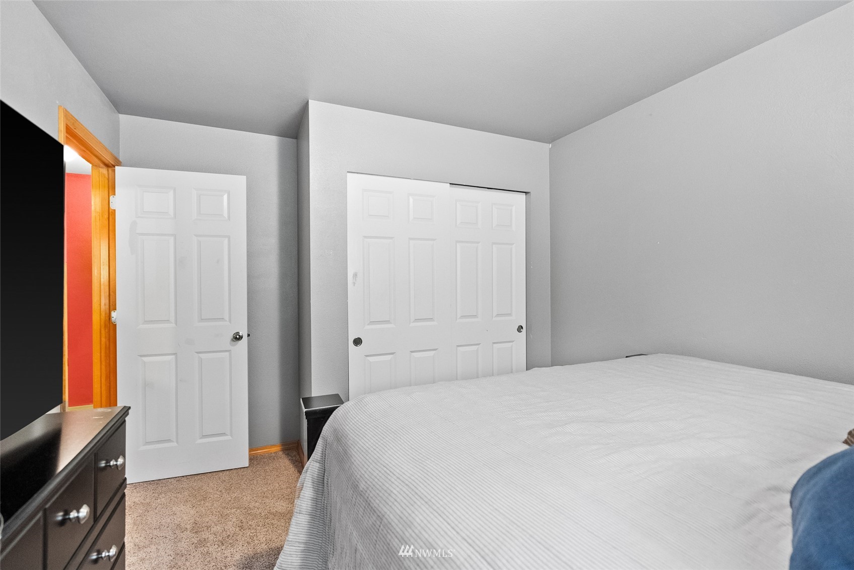 6741 Northwest Ranger Way Silverdale, WA 98383 - Photo 28 of 38 a bedroom with a bed and a window