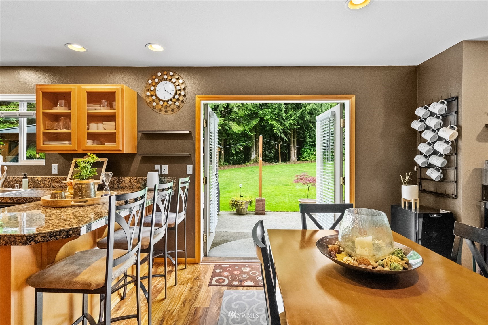 6741 Northwest Ranger Way Silverdale, WA 98383 - Photo 32 of 38 a living room with furniture and a large window