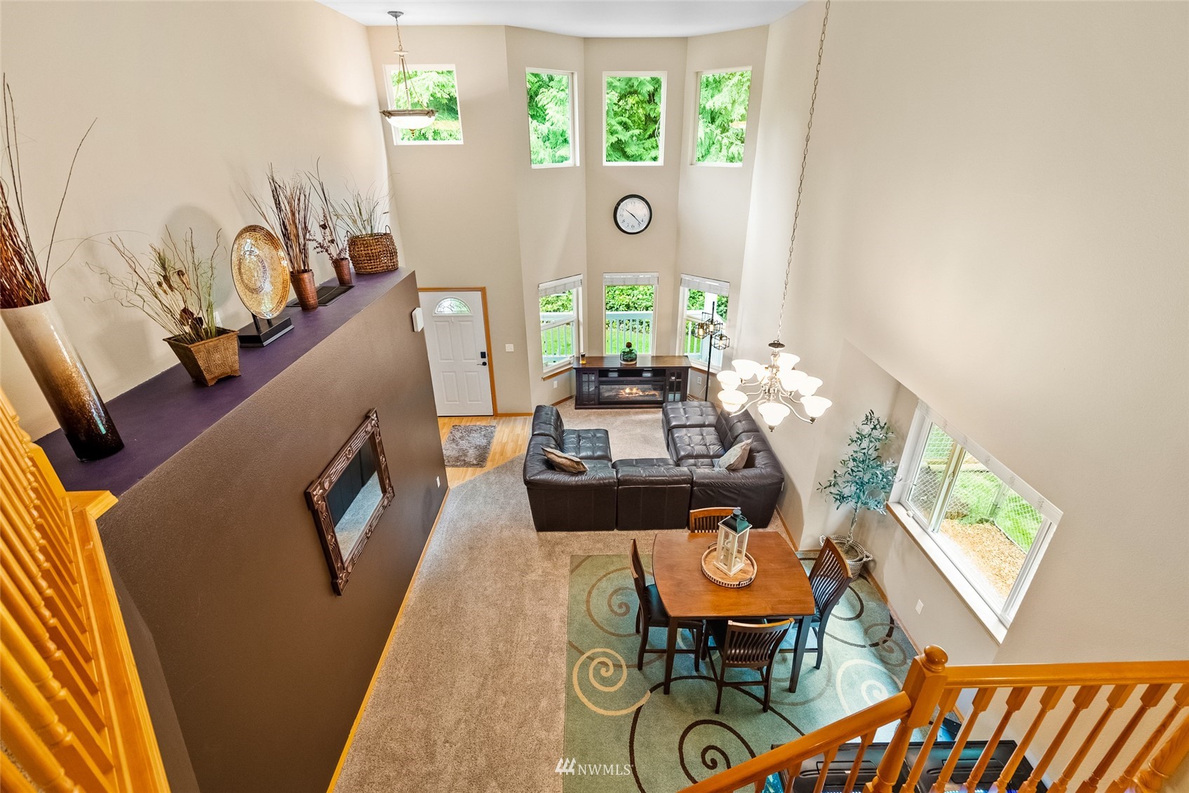 6741 Northwest Ranger Way Silverdale, WA 98383 - Photo 7 of 38 a living room with furniture and a large window