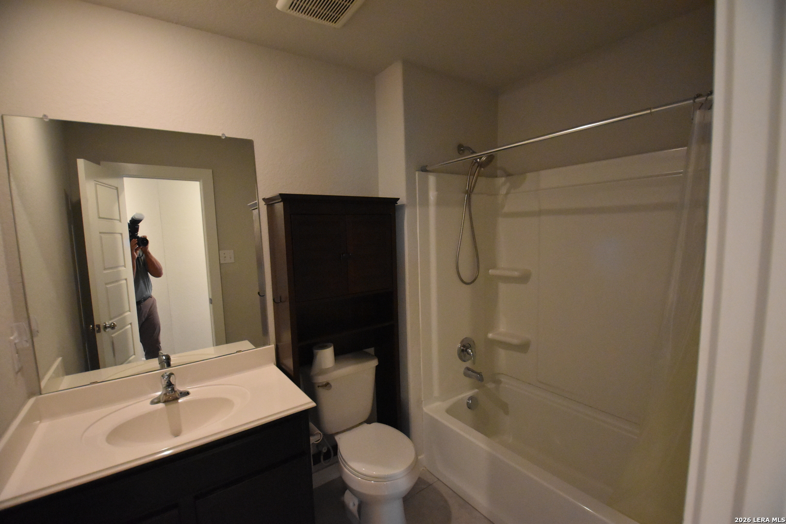 9111 Spigel Way Converse, TX 78109 - Photo 15 of 24 a bathroom with a sink a toilet and shower
