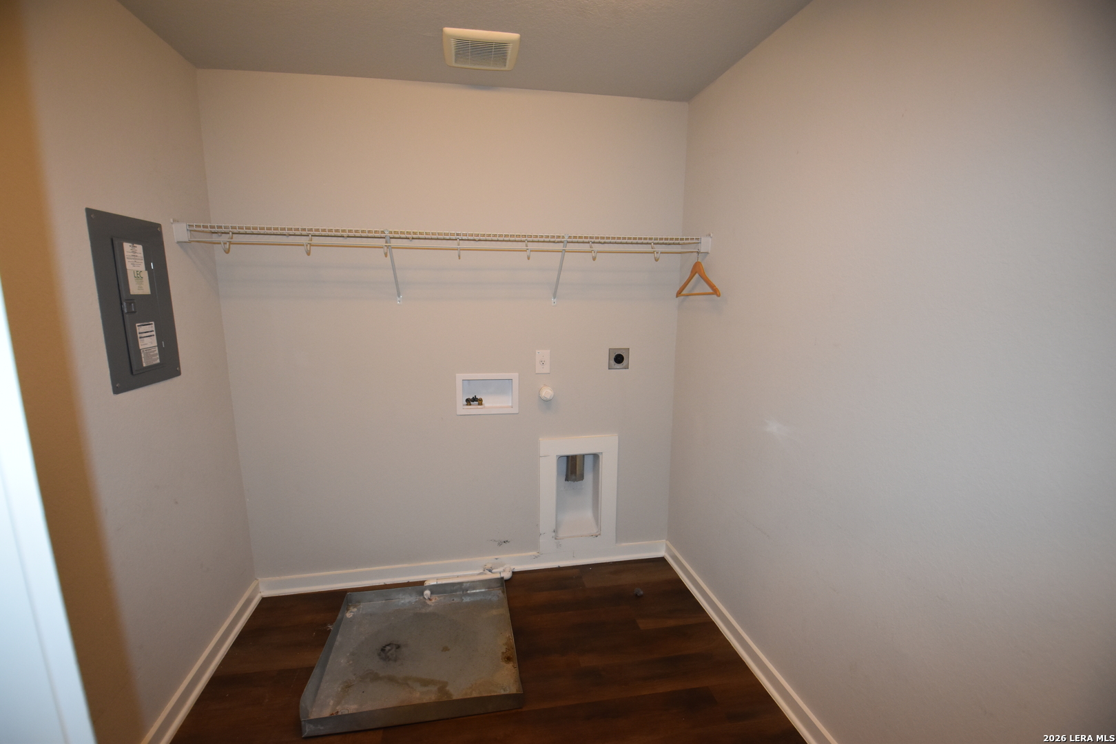 9111 Spigel Way Converse, TX 78109 - Photo 16 of 24 view of a room with wooden floor and white walls