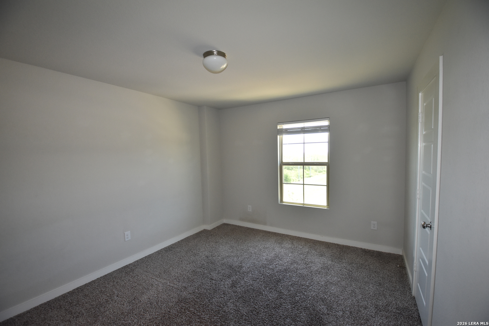 9111 Spigel Way Converse, TX 78109 - Photo 17 of 24 an empty room with window