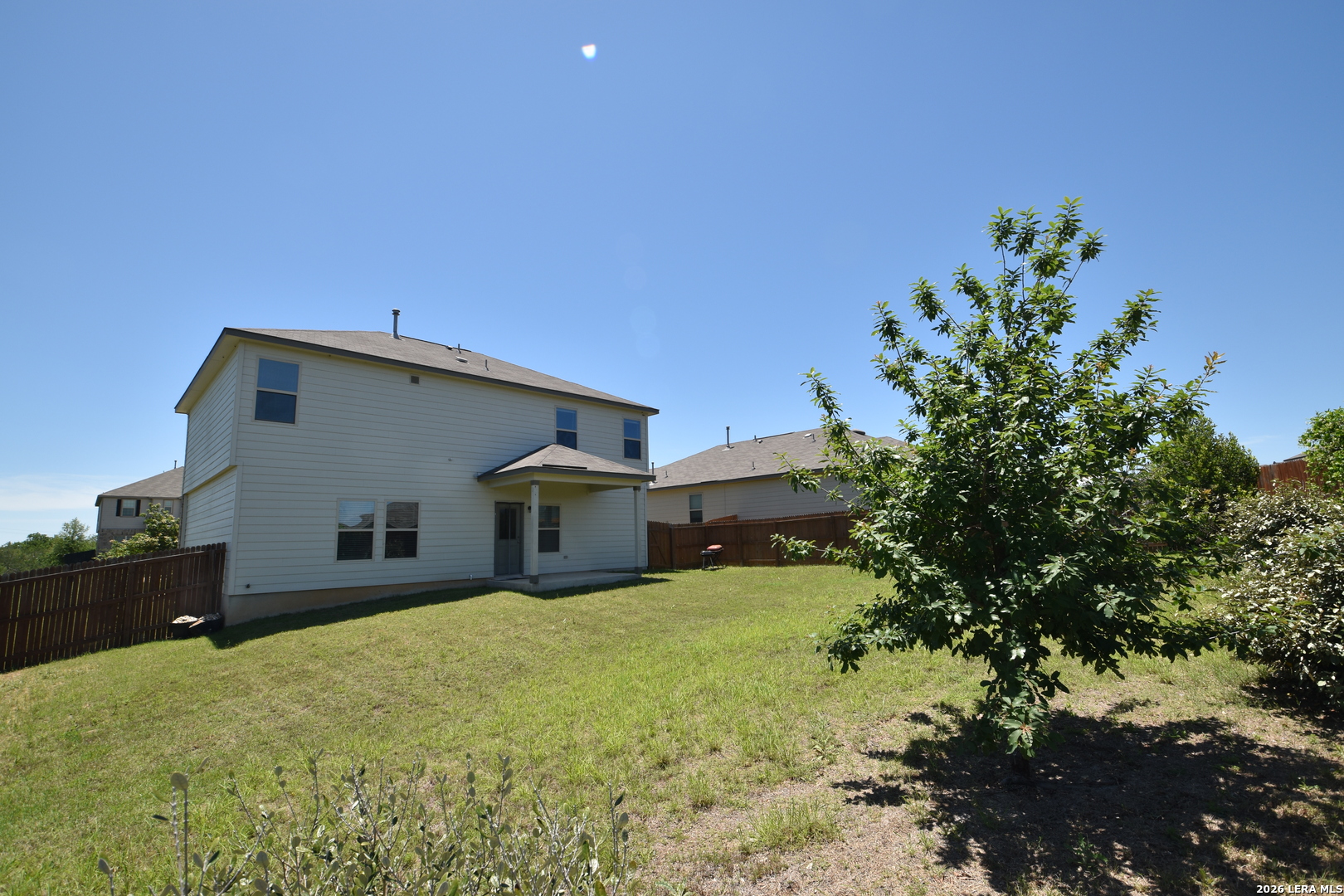 9111 Spigel Way Converse, TX 78109 - Photo 21 of 24 a house view with a garden space