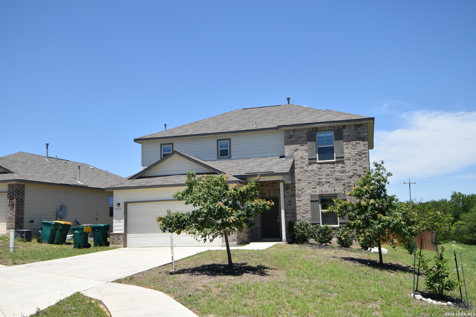 9111 Spigel Way Converse, TX 78109 - Photo 24 of 24 a front view of a house with a yard