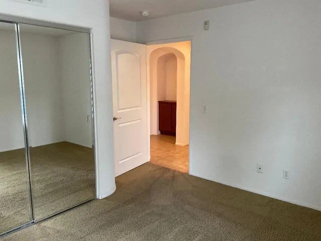 a view of a room with an empty space