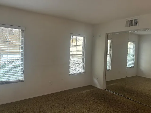 an empty room with windows