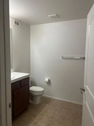 a bathroom with a toilet and a sink