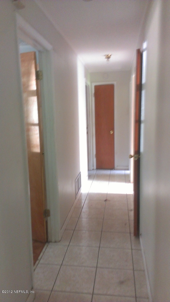 108 Silver Lake Road Palatka, FL 32177 - Photo 11 of 14 HALLWAY TO BEDROOMS AND BATHS