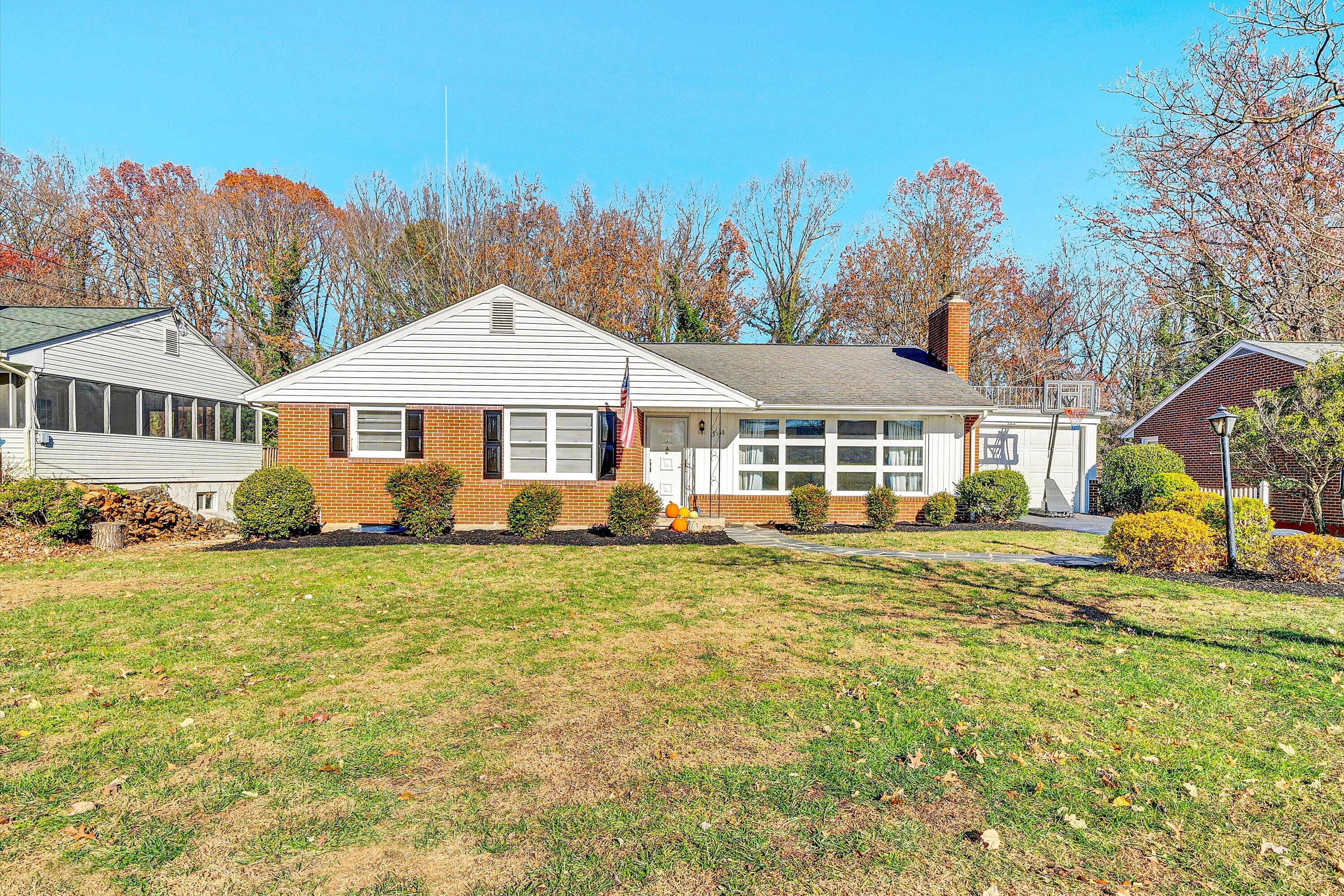 3558 Wright Road Southwest Roanoke, VA 24015 - Photo 1 of 30 a front view of a house with garden