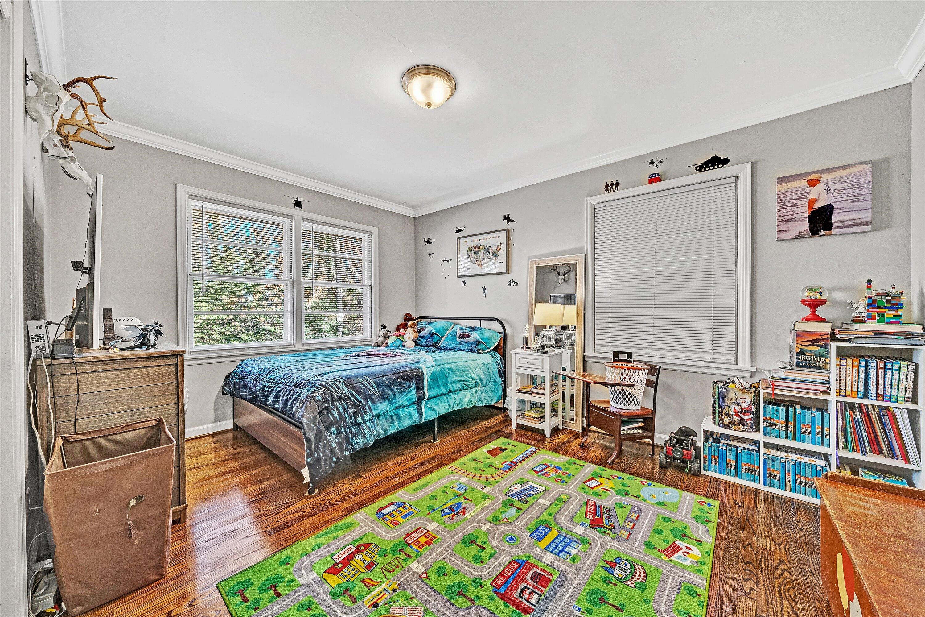 3558 Wright Road Southwest Roanoke, VA 24015 - Photo 11 of 30 a bedroom with furniture and a book shelf