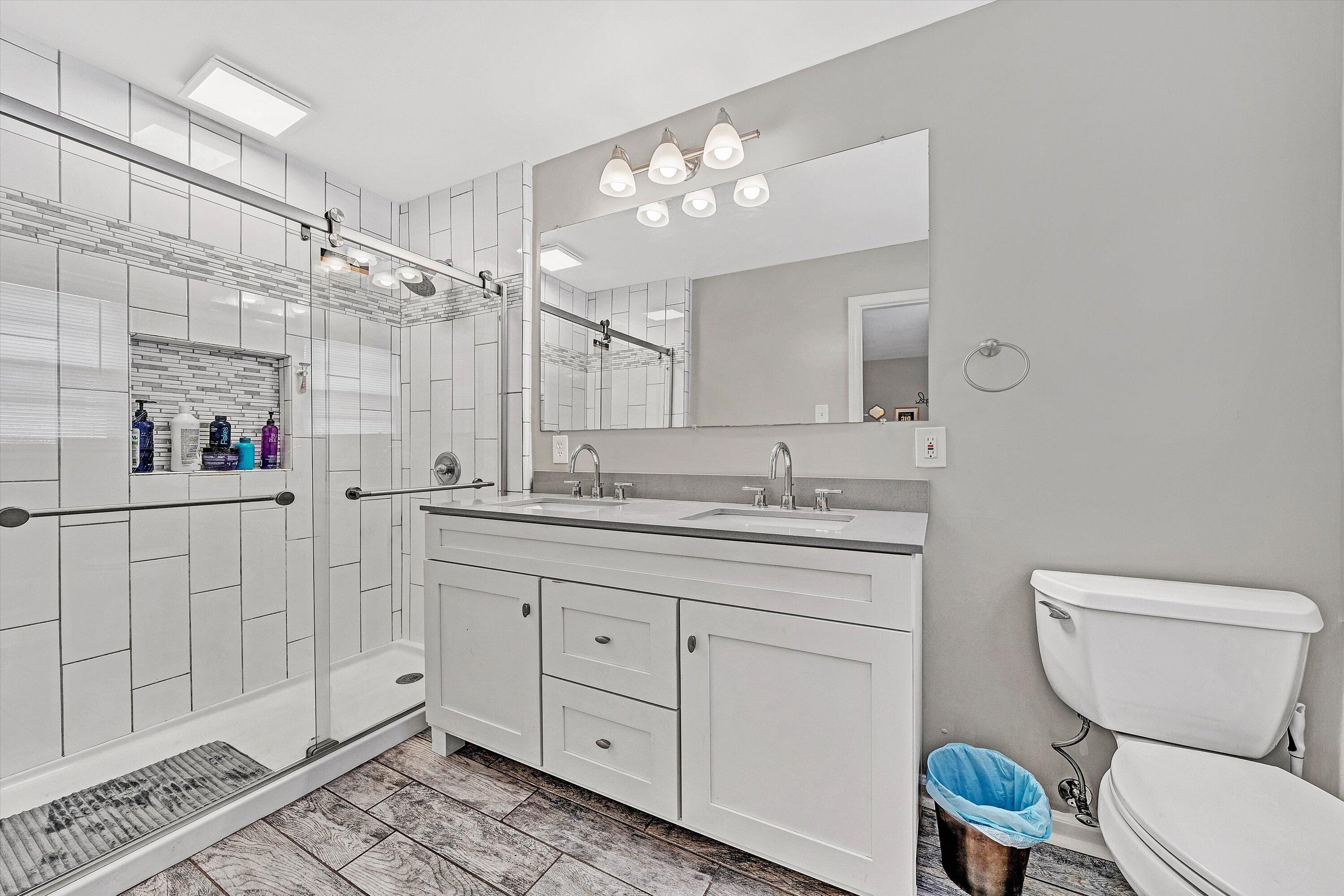 3558 Wright Road Southwest Roanoke, VA 24015 - Photo 19 of 30 a bathroom with a toilet sink and a mirror