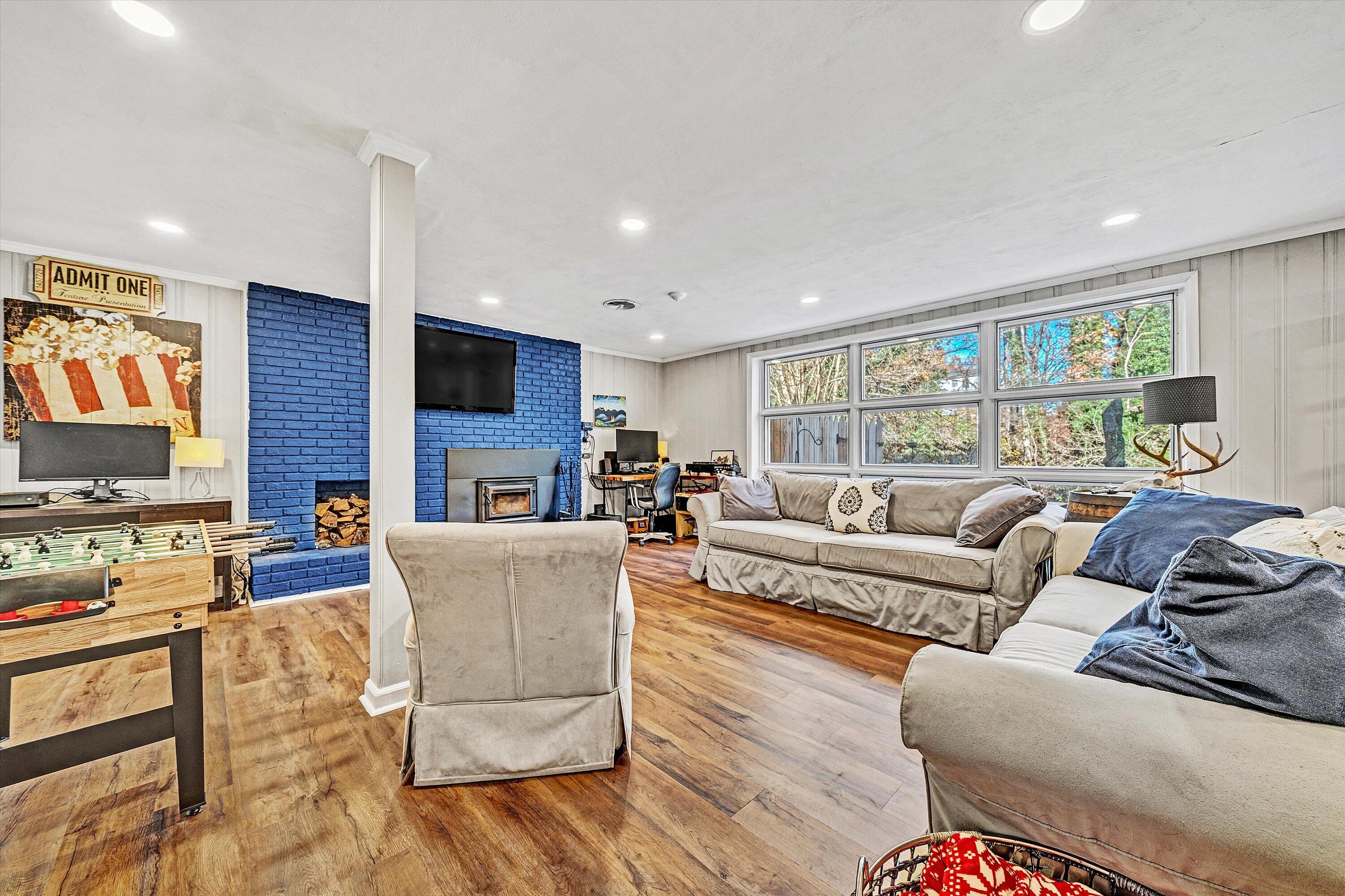 3558 Wright Road Southwest Roanoke, VA 24015 - Photo 21 of 30 a living room with furniture and a flat screen tv