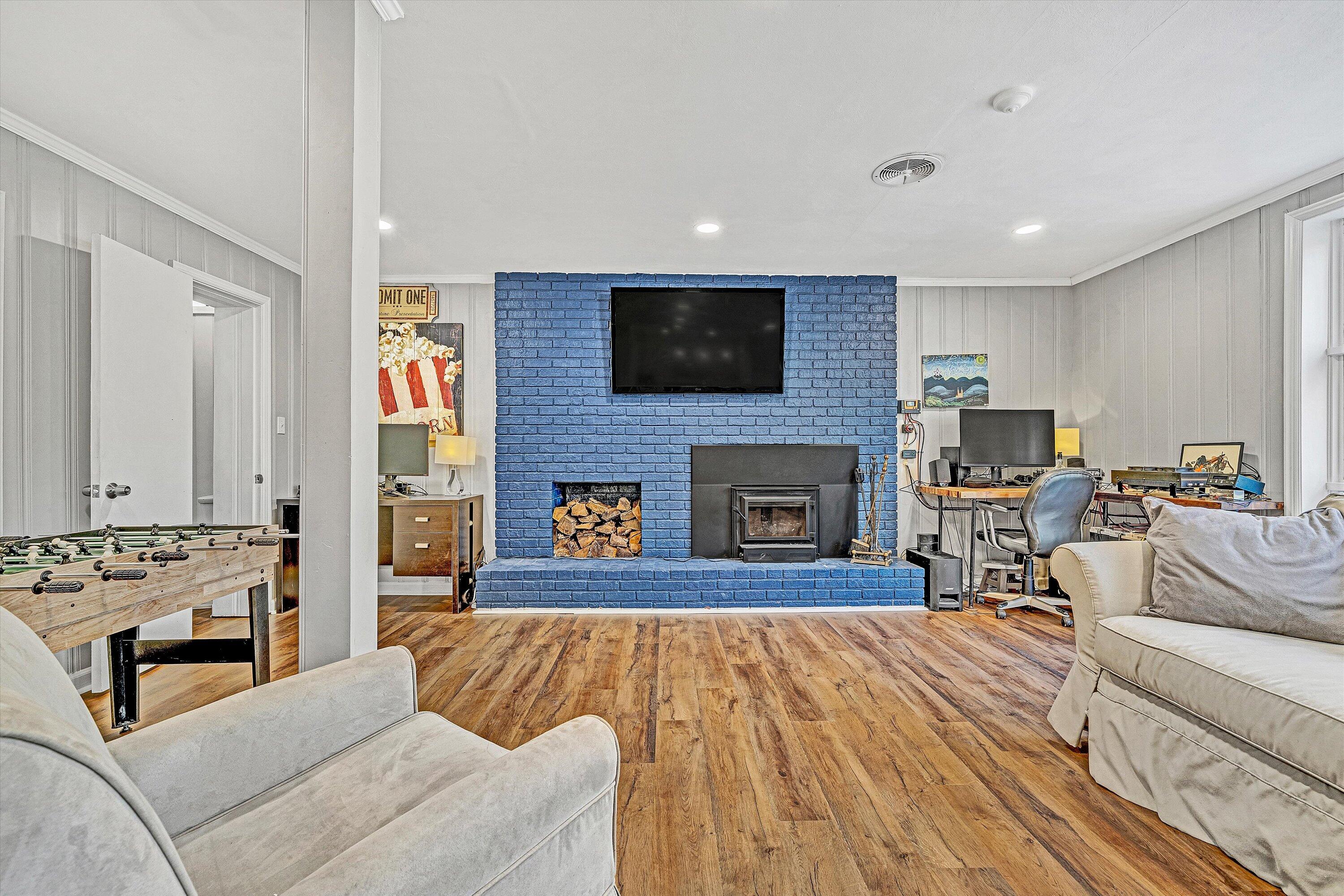 3558 Wright Road Southwest Roanoke, VA 24015 - Photo 22 of 30 a living room with furniture and a fireplace