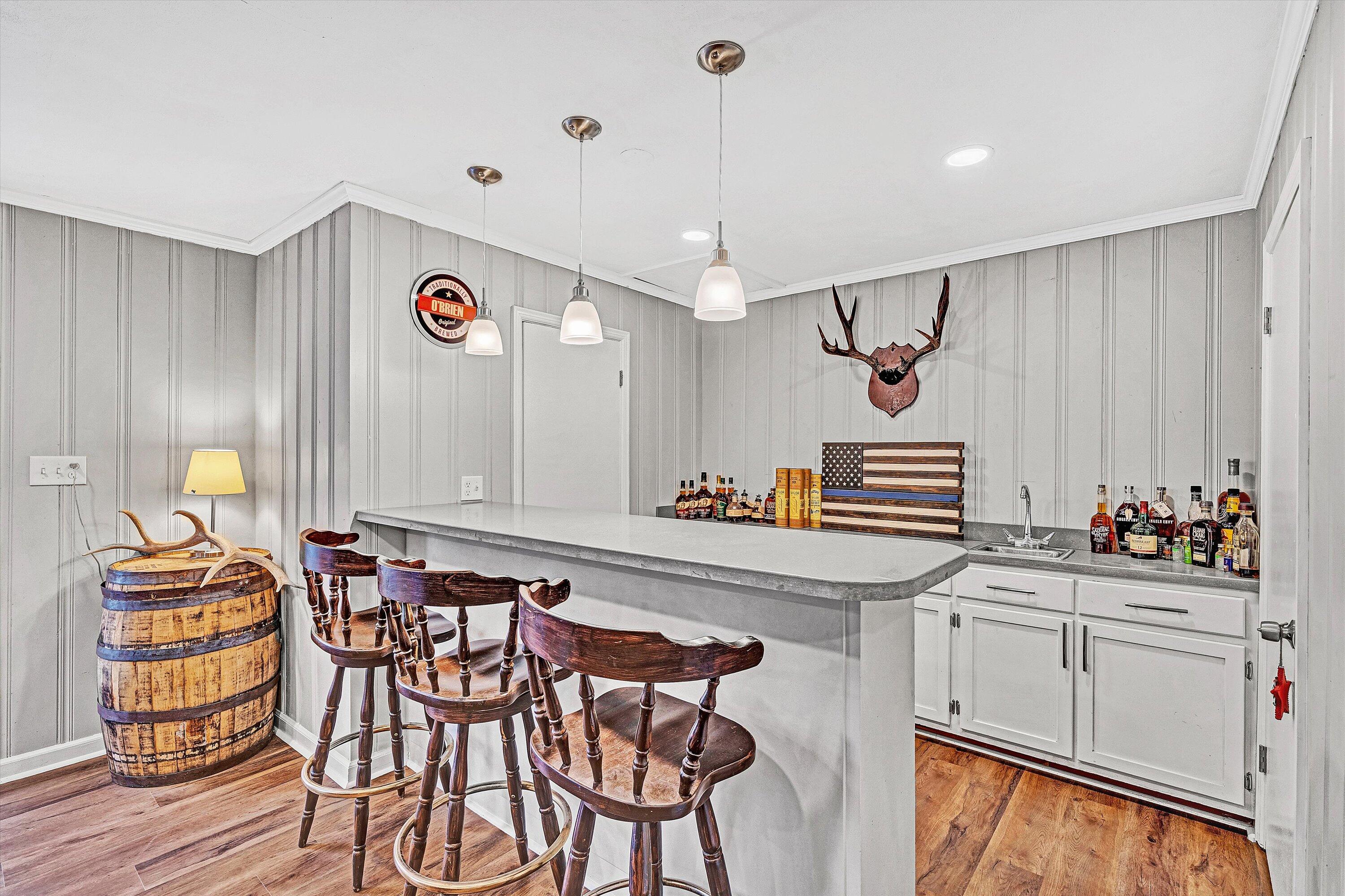 3558 Wright Road Southwest Roanoke, VA 24015 - Photo 24 of 30 a view of a kitchen and dining room with furniture wooden floor and window
