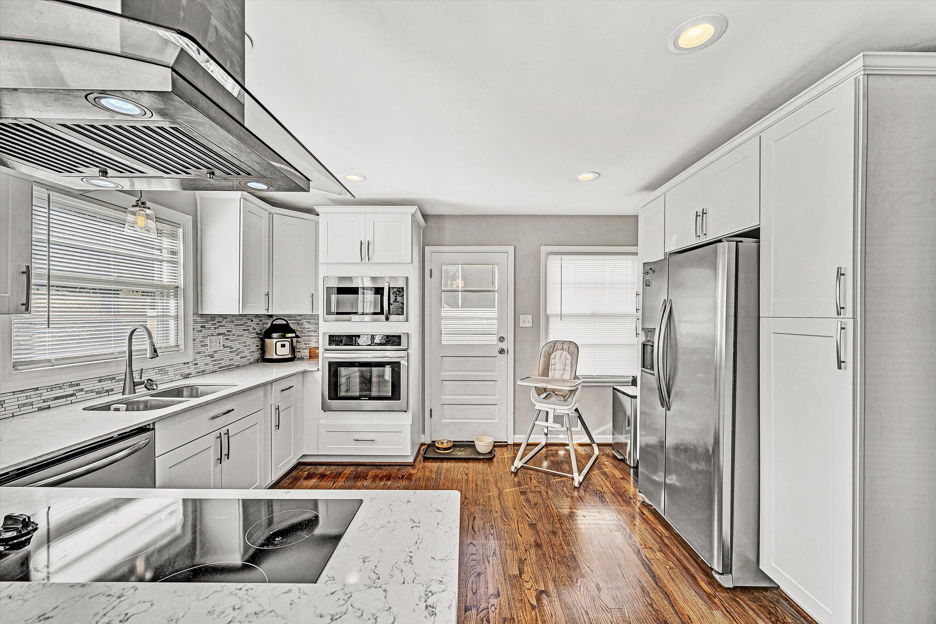 3558 Wright Road Southwest Roanoke, VA 24015 - Photo 7 of 30 a kitchen with stainless steel appliances granite countertop a refrigerator and a sink
