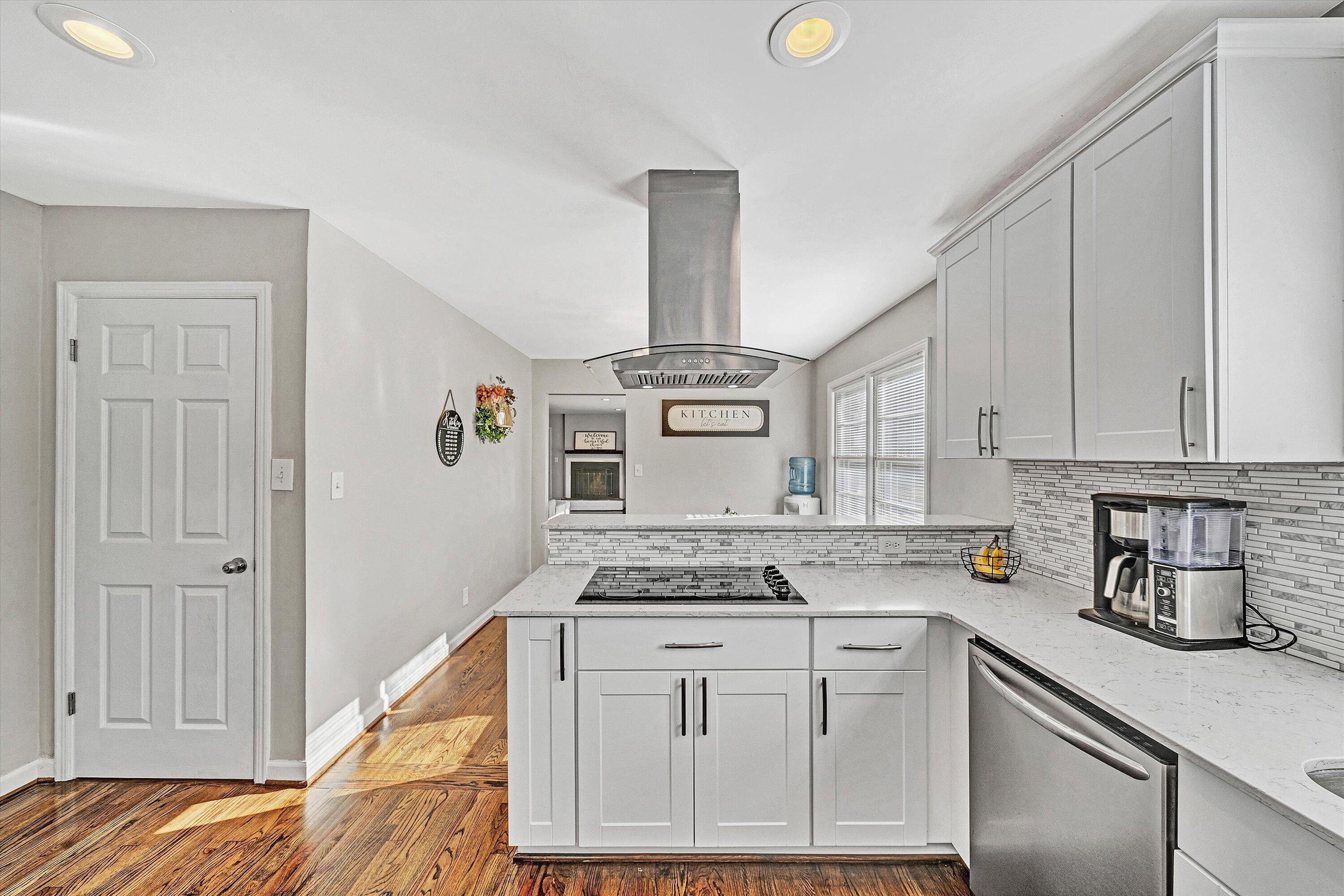 3558 Wright Road Southwest Roanoke, VA 24015 - Photo 10 of 30 a kitchen with stainless steel appliances granite countertop a stove and cabinets