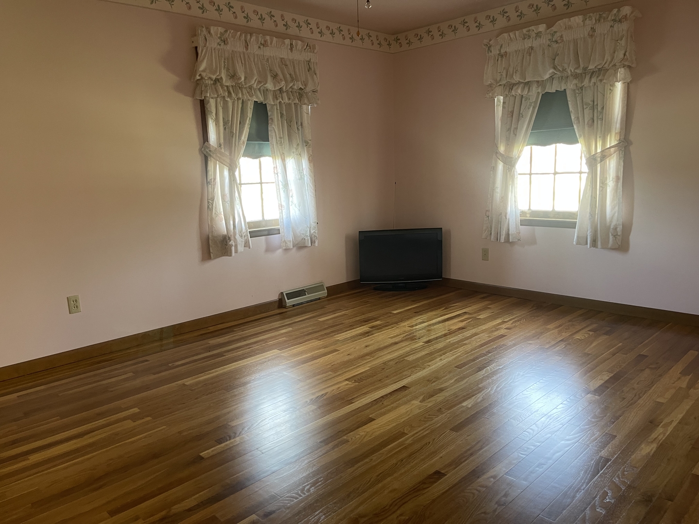 902 16th Street Peru, IL 61354 - Photo 13 of 23 an empty room with wooden floor and windows
