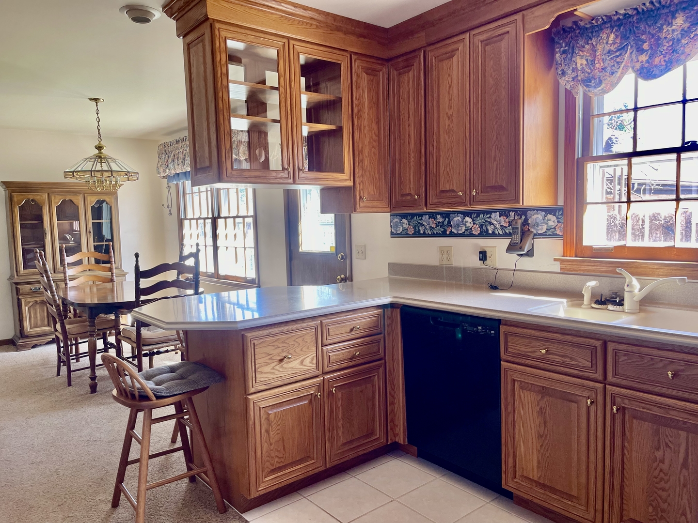 902 16th Street Peru, IL 61354 - Photo 7 of 23 a kitchen with stainless steel appliances granite countertop a sink and cabinets