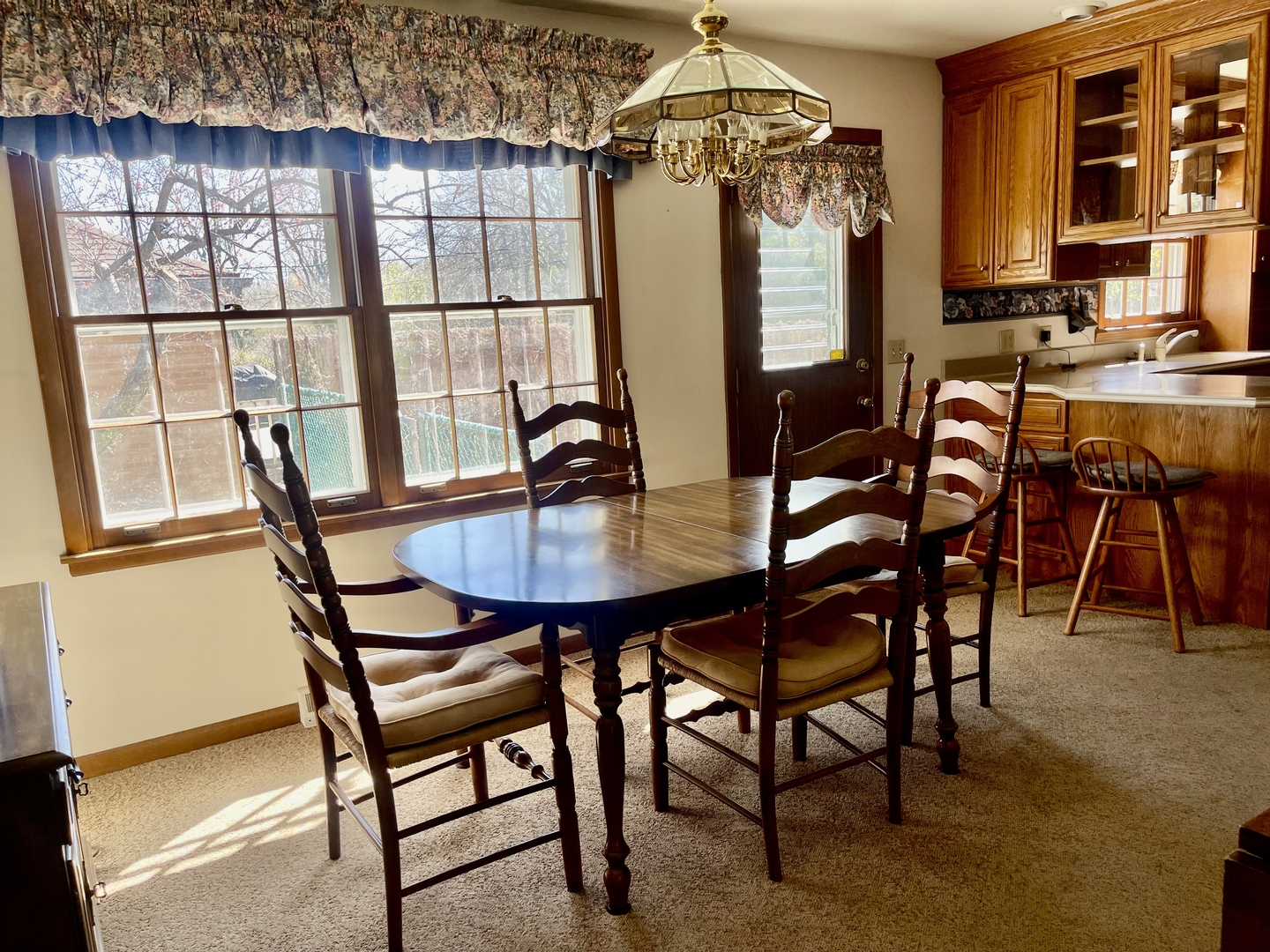 902 16th Street Peru, IL 61354 - Photo 10 of 23 a view of a dining room with furniture and chandelier