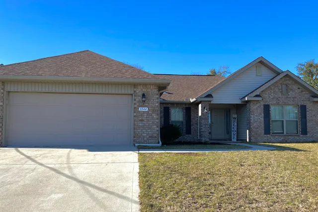 a house view with a outdoor space