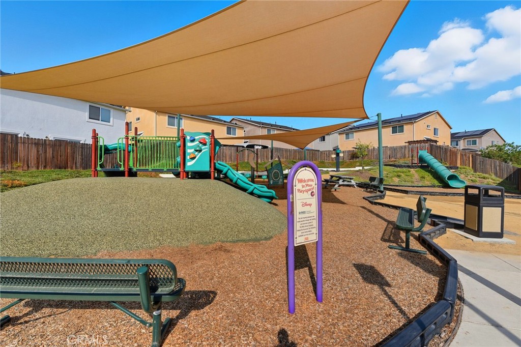 21711 Doss Place Saugus, CA 91350 - Photo 23 of 27 a view of a backyard with a patio