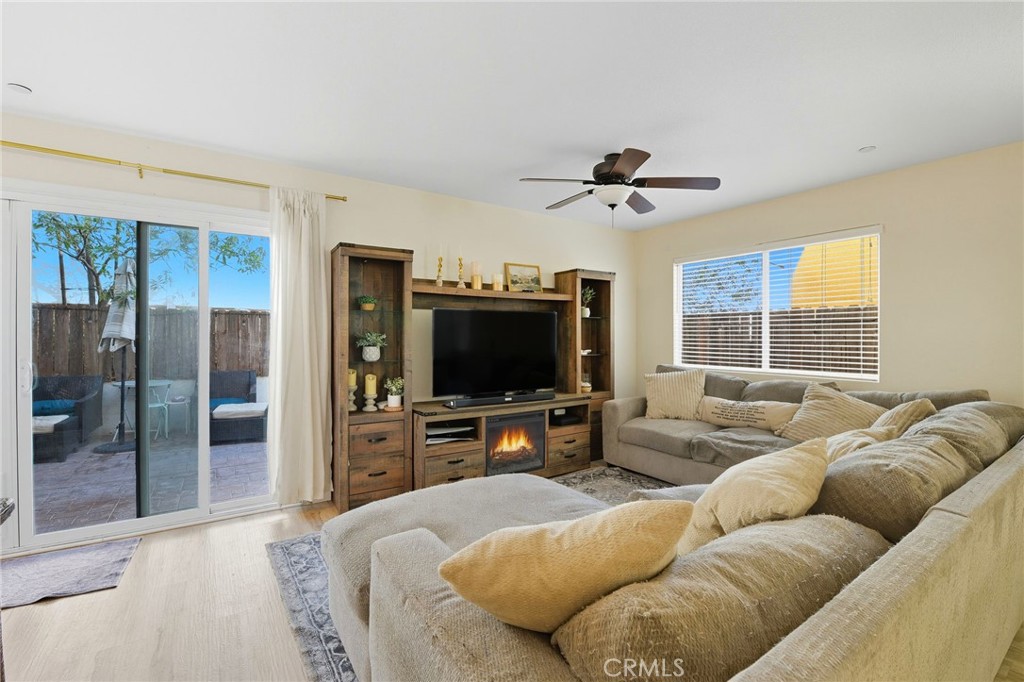 21711 Doss Place Saugus, CA 91350 - Photo 7 of 27 a living room with furniture and a flat screen tv