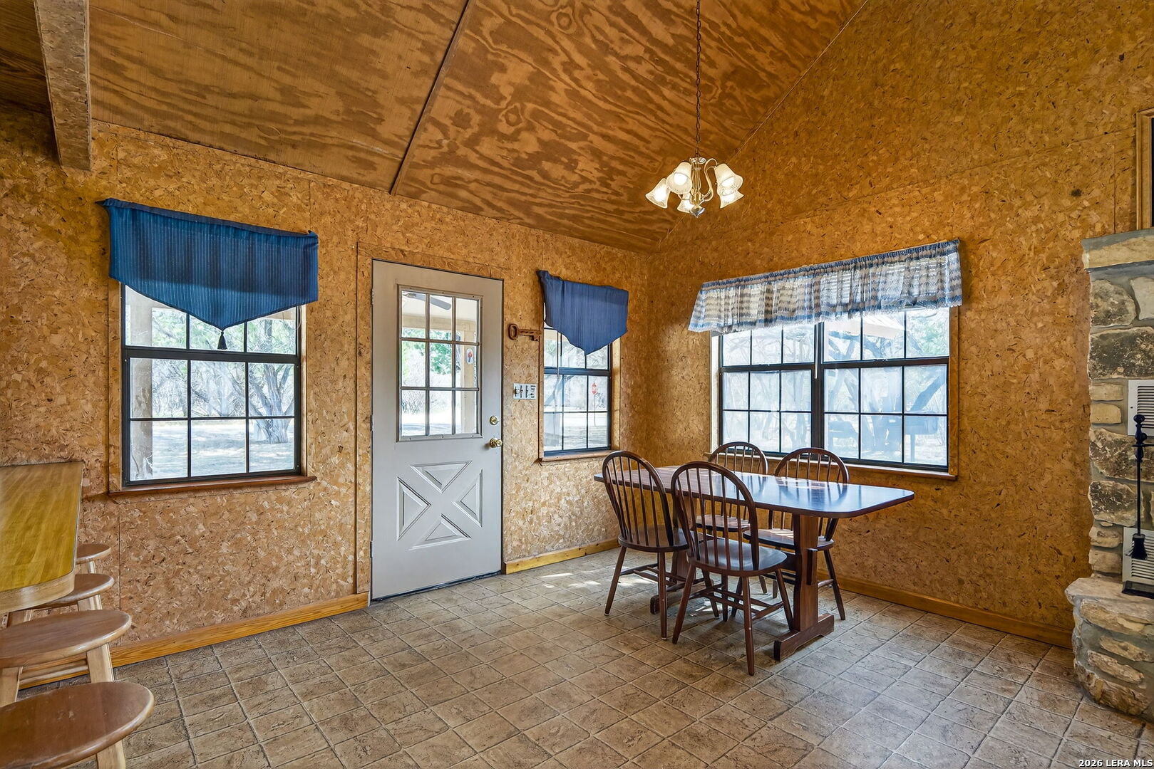 15 Cedar Lane Concan, TX 78838 - Photo 16 of 49 a view of a dining room with furniture and chandelier