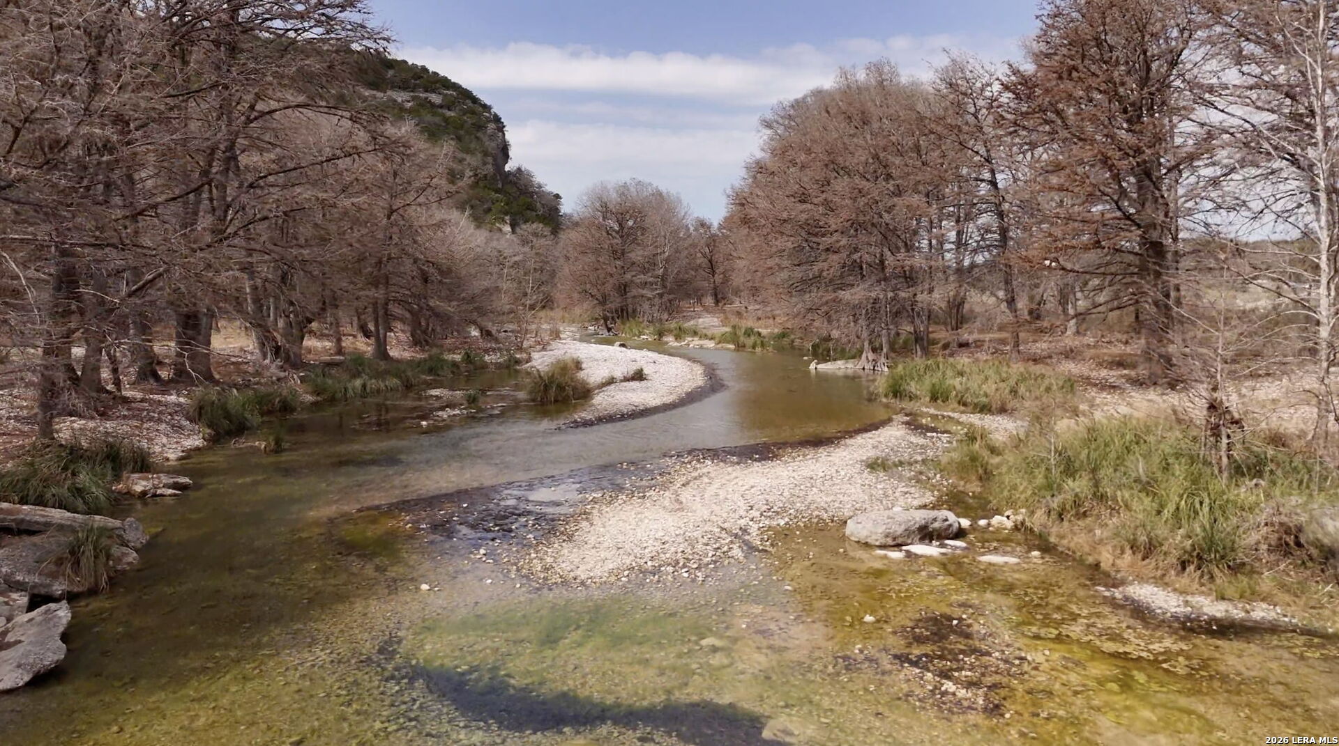 15 Cedar Lane Concan, TX 78838 - Photo 3 of 49 a view of a dirt yard
