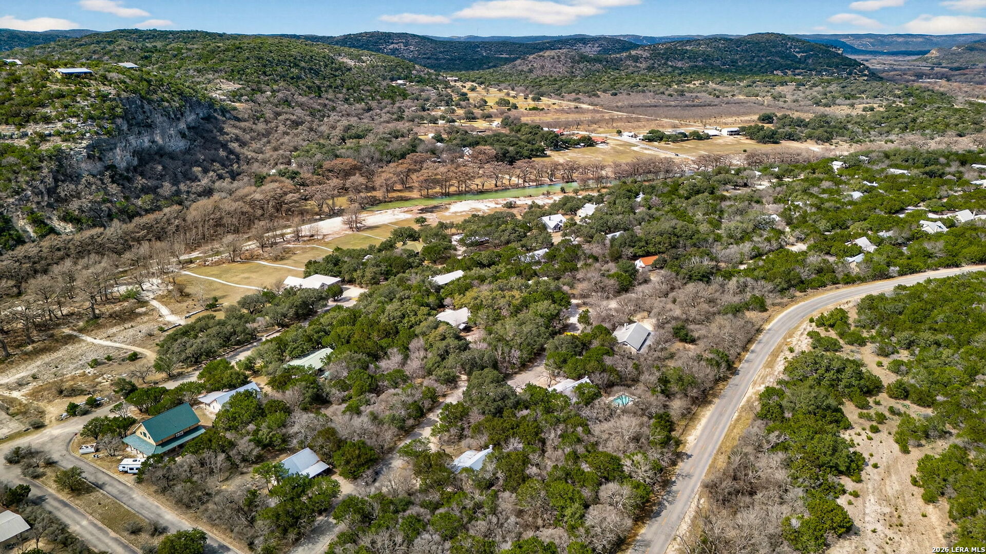 15 Cedar Lane Concan, TX 78838 - Photo 35 of 49 a view of a lake with houses