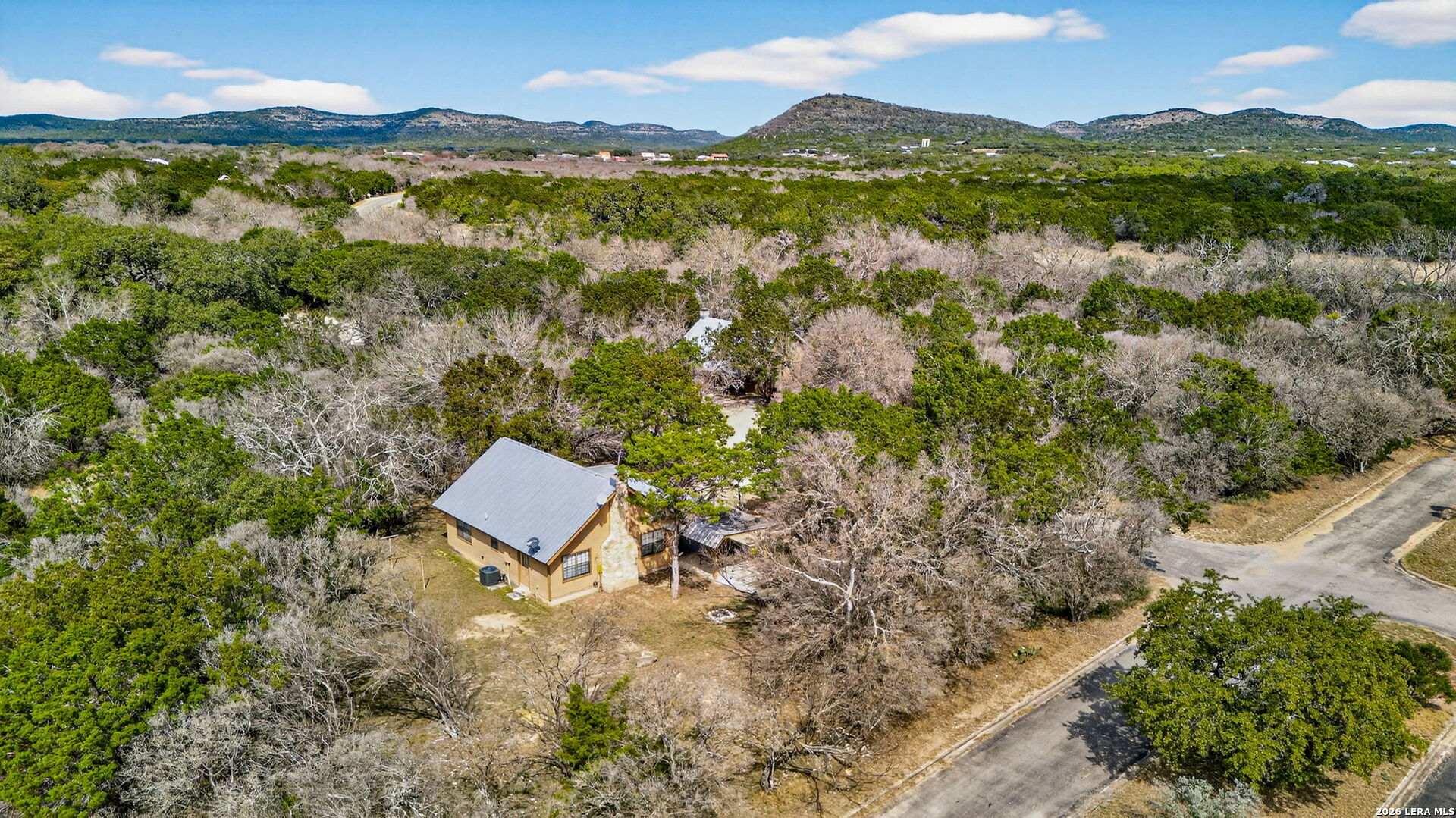 15 Cedar Lane Concan, TX 78838 - Photo 38 of 49 a view of a mountain with a lush green hillside