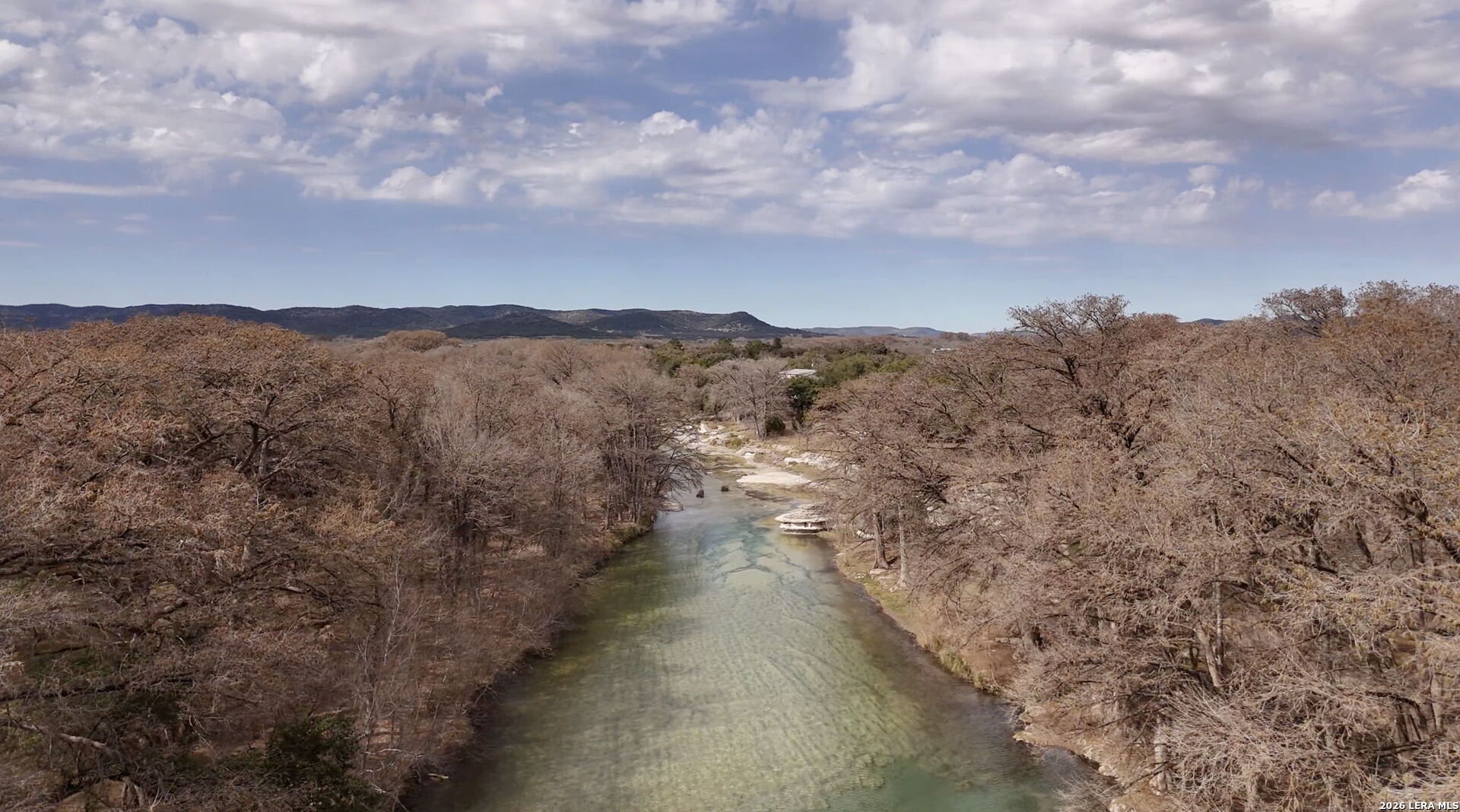 15 Cedar Lane Concan, TX 78838 - Photo 47 of 49 an aerial view of houses covered in trees