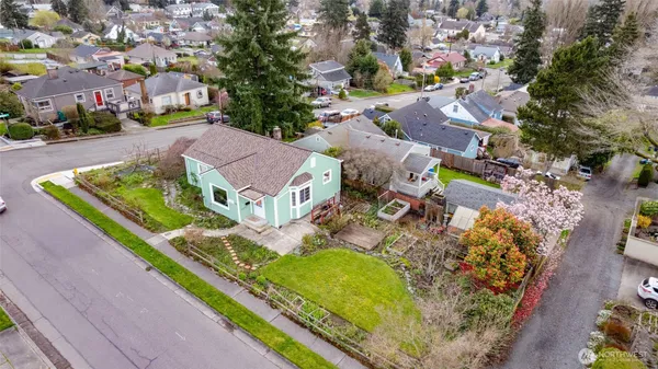 a pathway of a house with a yard