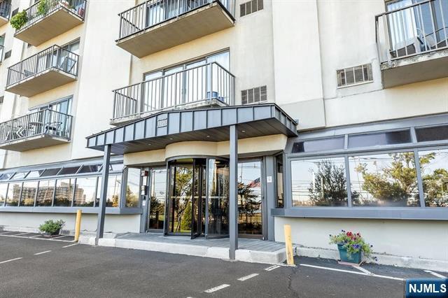 1150 River Road, Unit 4F Edgewater, NJ 07020 - Photo 19 of 22 a view of a building with a window and sitting area
