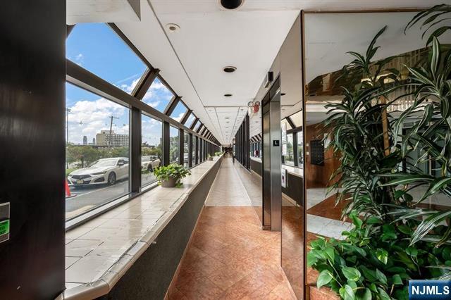 1150 River Road, Unit 4F Edgewater, NJ 07020 - Photo 21 of 22 a view of entryway and hall with wooden floor