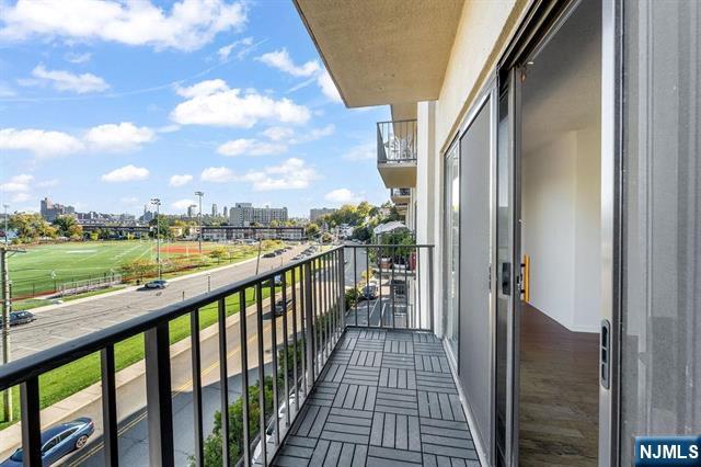 1150 River Road, Unit 4F Edgewater, NJ 07020 - Photo 9 of 22 a view of a balcony with city view