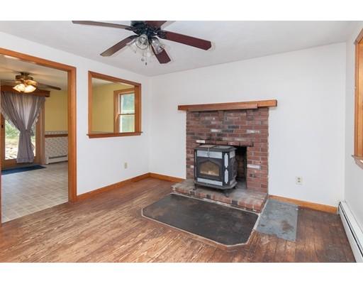 25 Cahoon Road Wareham, MA 02532 - Photo 8 of 24 a living room with furniture and a fireplace