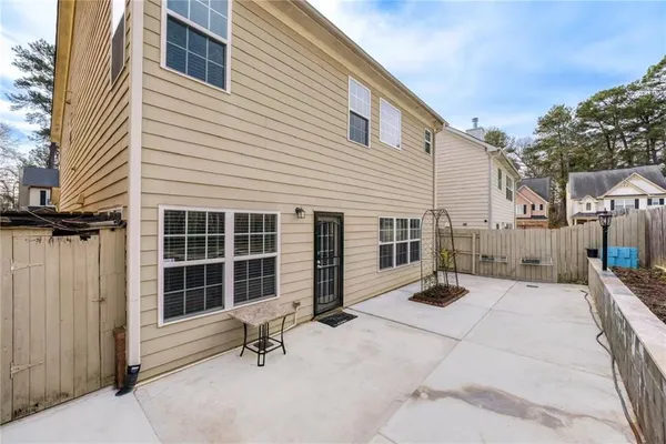 a view of a house with a sitting area