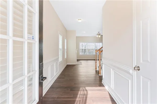 a view of a hallway with windows