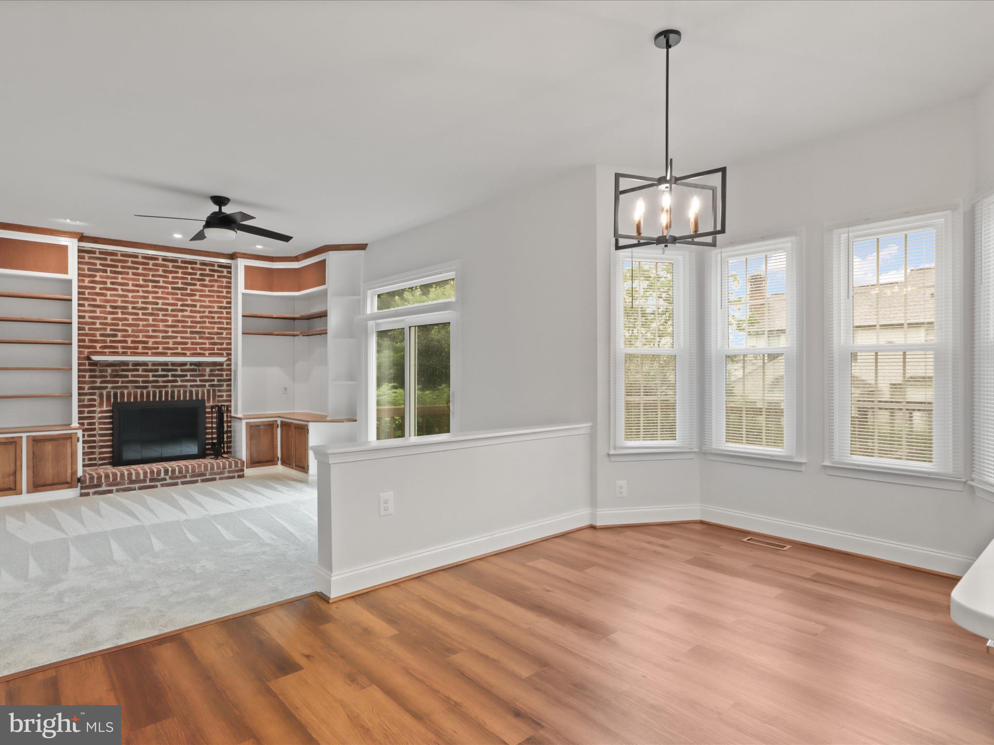 9365 River Crest Road Manassas, VA 20110 - Photo 18 of 62 a view of empty room with wooden floor and fireplace
