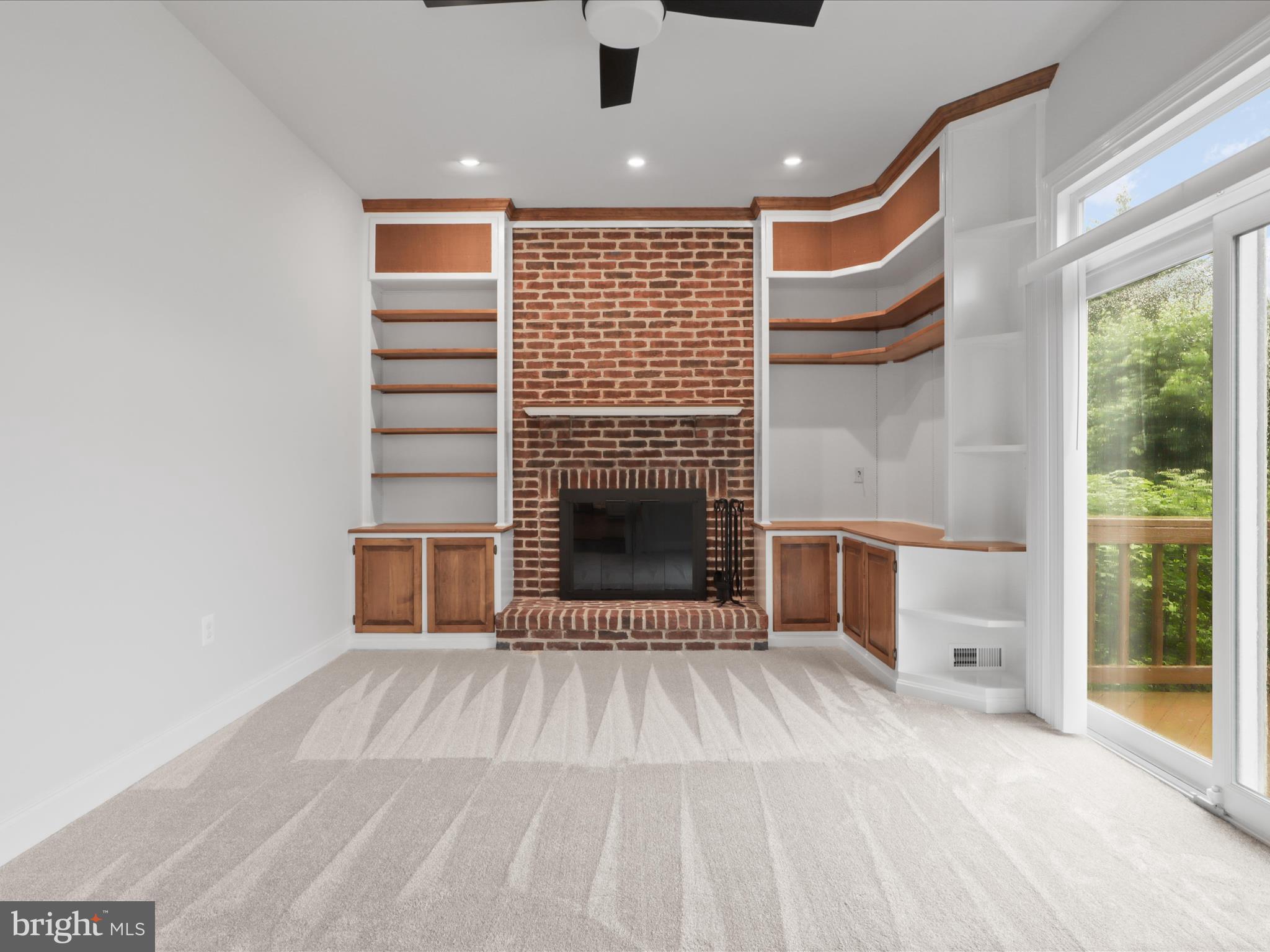 9365 River Crest Road Manassas, VA 20110 - Photo 22 of 62 a view of a livingroom with a fireplace