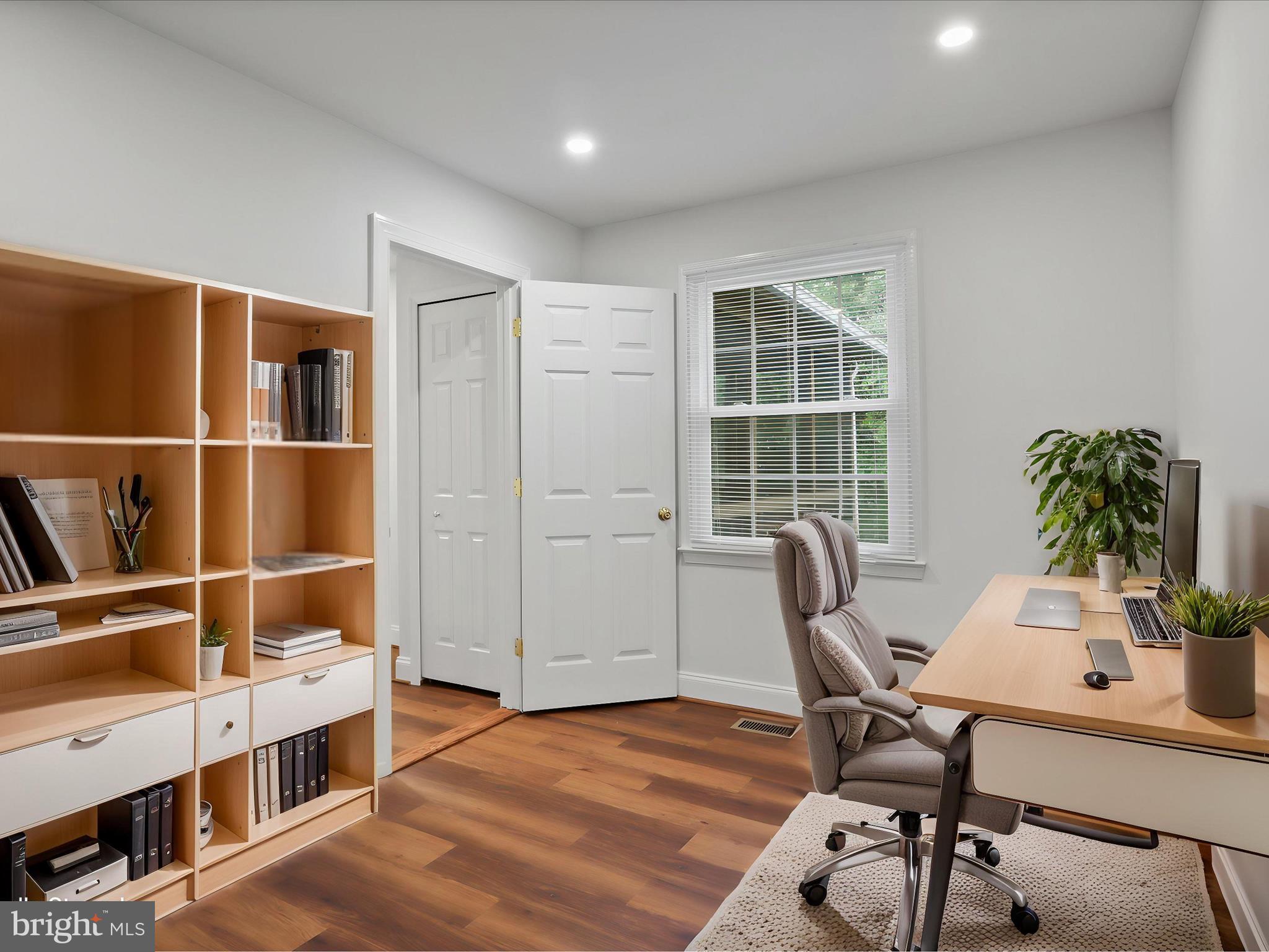 9365 River Crest Road Manassas, VA 20110 - Photo 25 of 62 a view of a workspace with furniture and a window