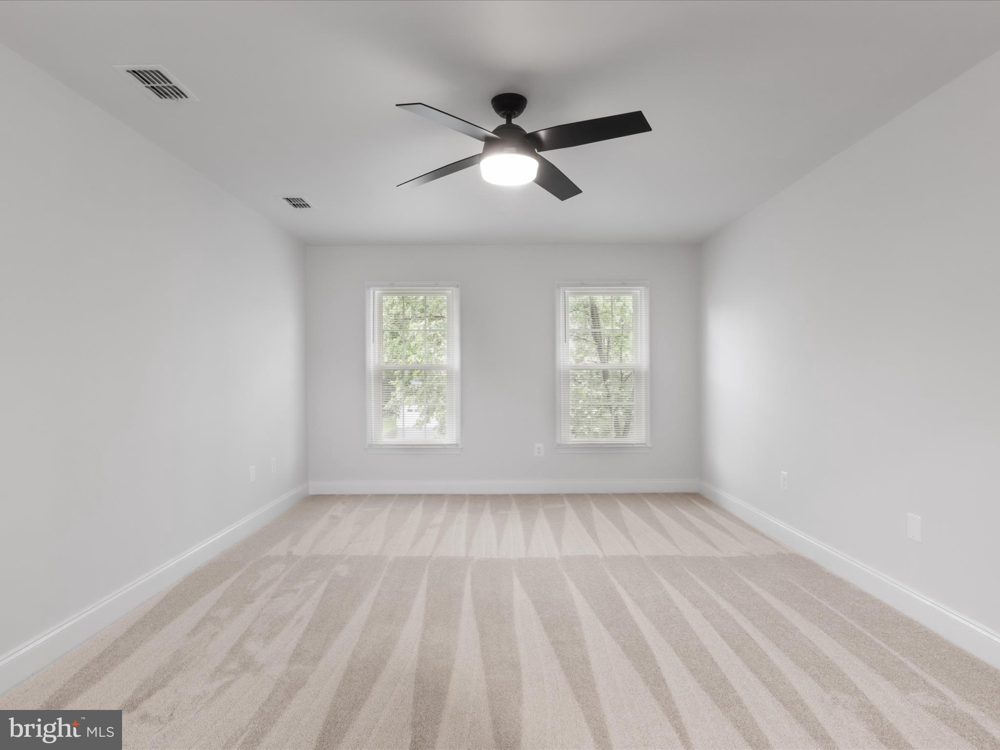 9365 River Crest Road Manassas, VA 20110 - Photo 29 of 62 wooden floor in an empty room with a window