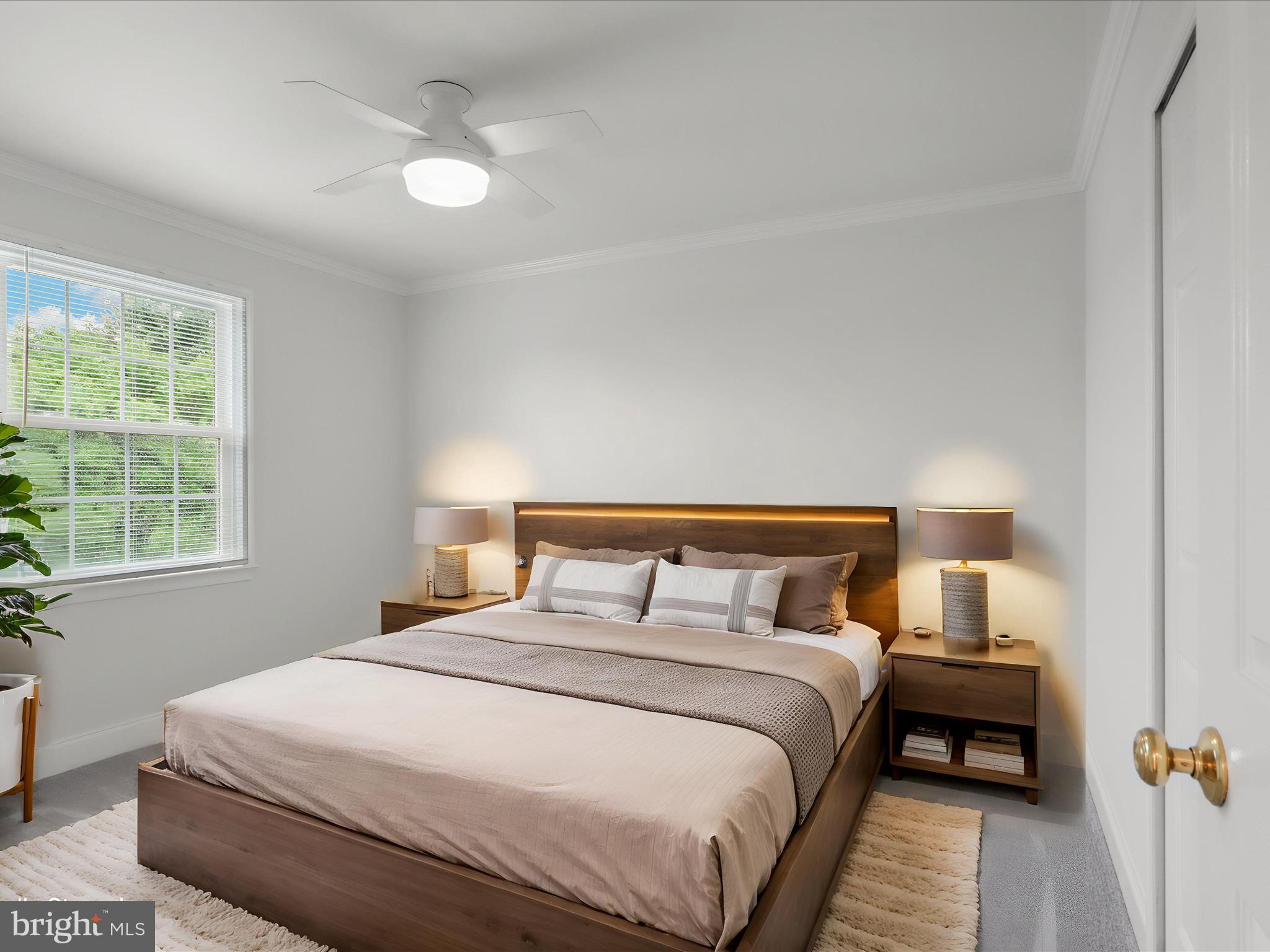 9365 River Crest Road Manassas, VA 20110 - Photo 36 of 62 a bedroom with a bed and window