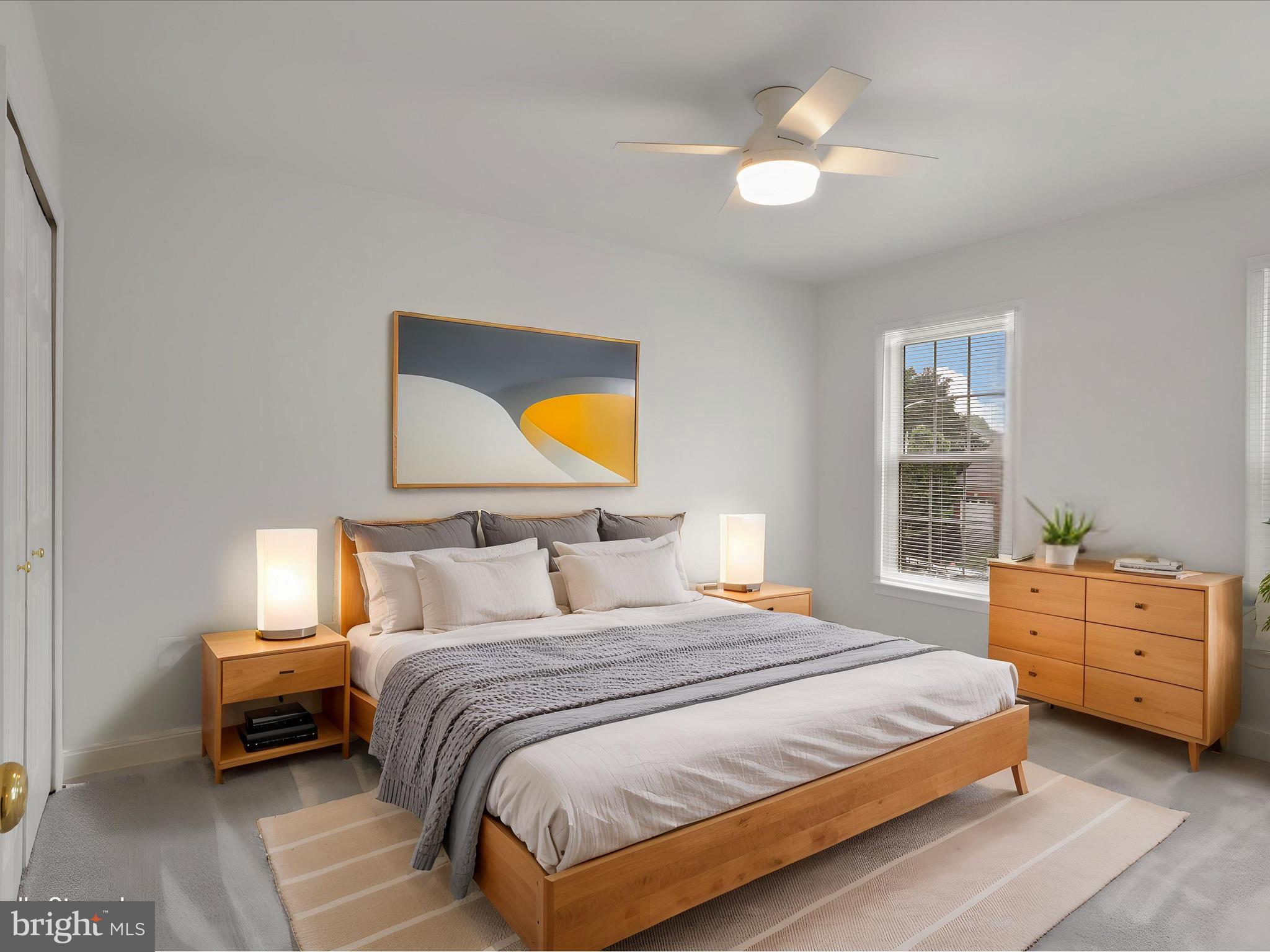 9365 River Crest Road Manassas, VA 20110 - Photo 38 of 62 a bedroom with a bed and a chandelier