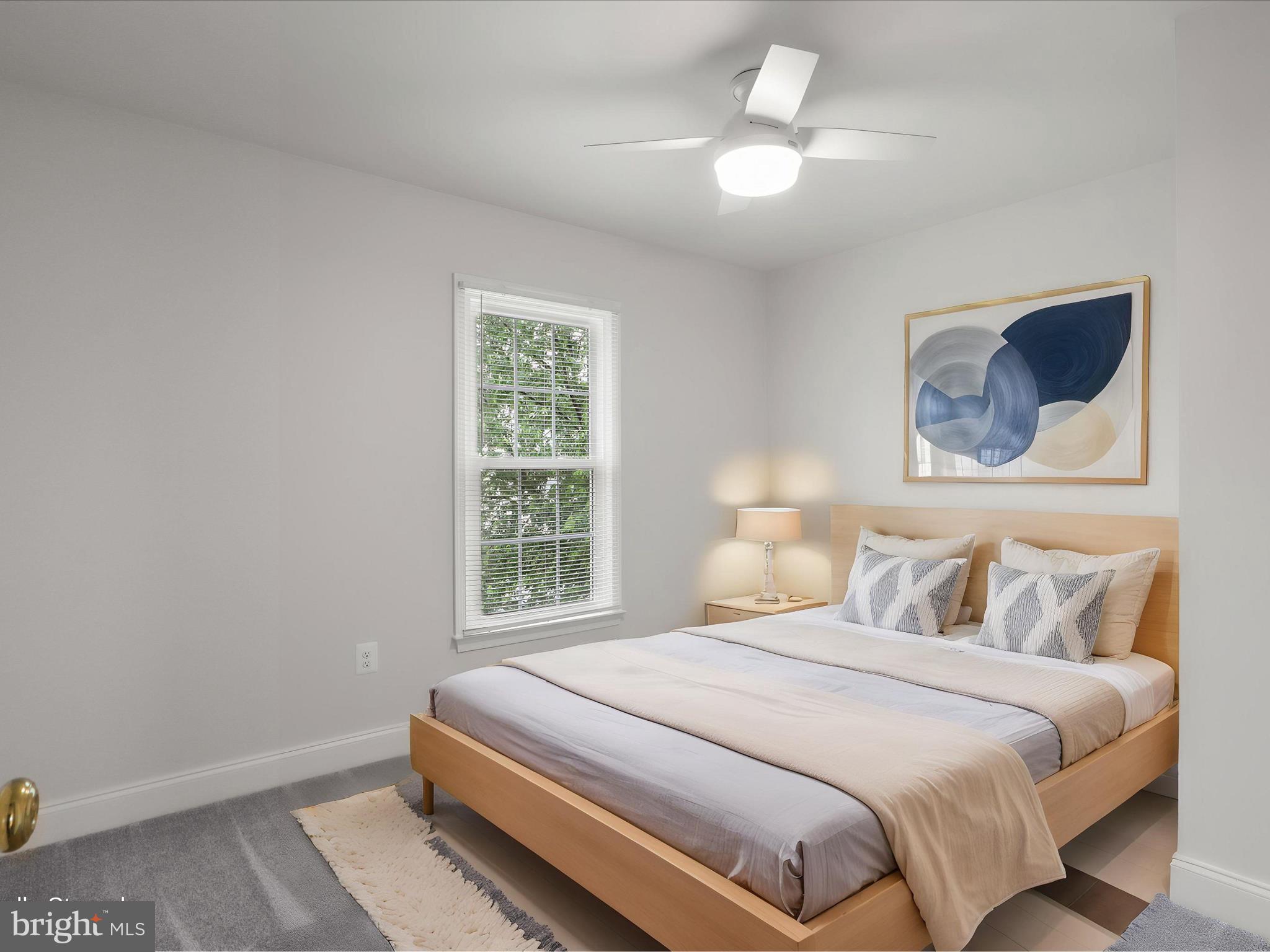 9365 River Crest Road Manassas, VA 20110 - Photo 40 of 62 a bedroom with a bed and a painting on the wall