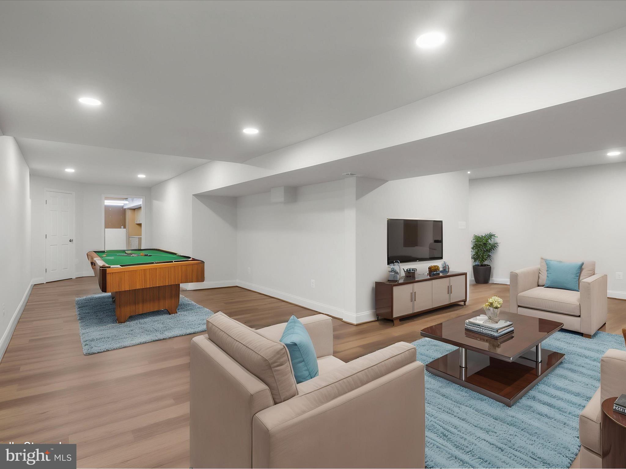 9365 River Crest Road Manassas, VA 20110 - Photo 45 of 62 a living room with furniture and a flat screen tv