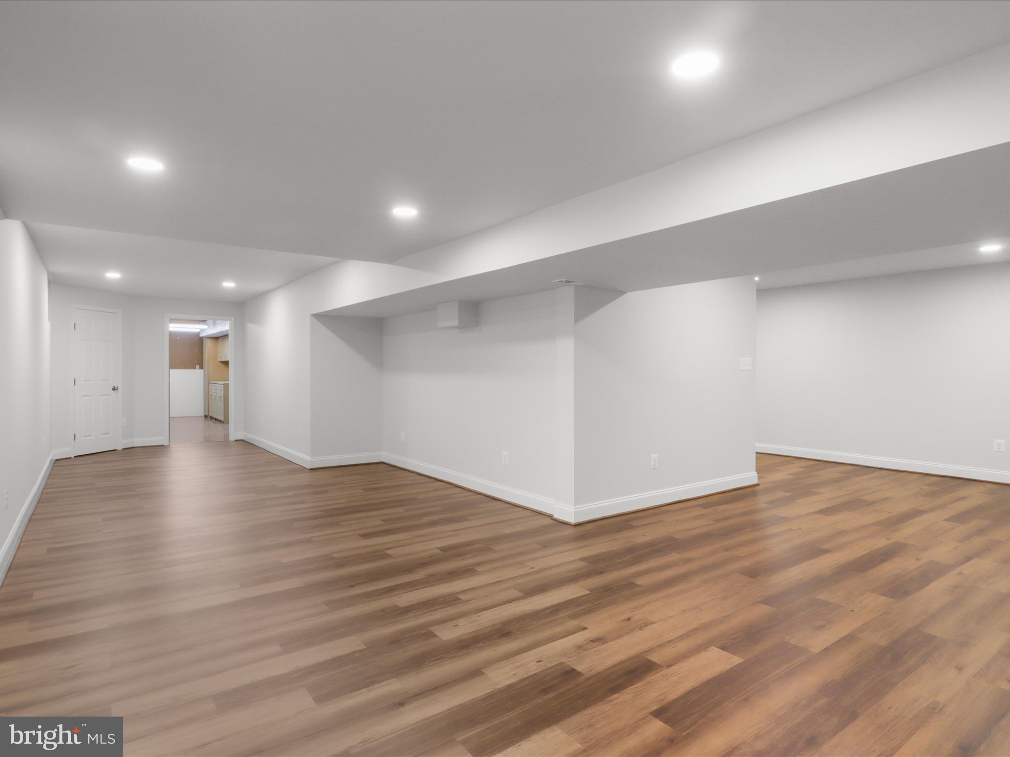 9365 River Crest Road Manassas, VA 20110 - Photo 46 of 62 a view of empty room with wooden floor