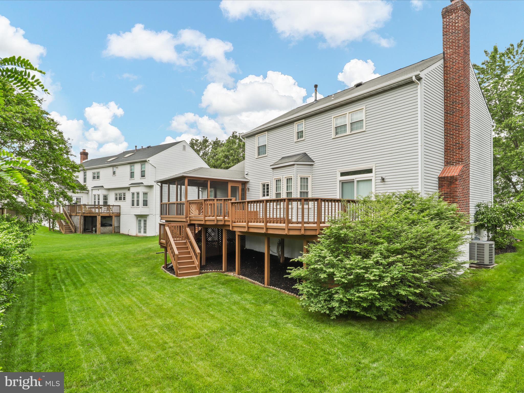 9365 River Crest Road Manassas, VA 20110 - Photo 49 of 62 a view of a house with a big yard and large trees