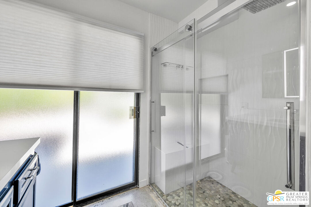 20 Kevin Lee Lane Rancho Mirage, CA 92270 - Photo 17 of 40 a bathroom with a glass shower door